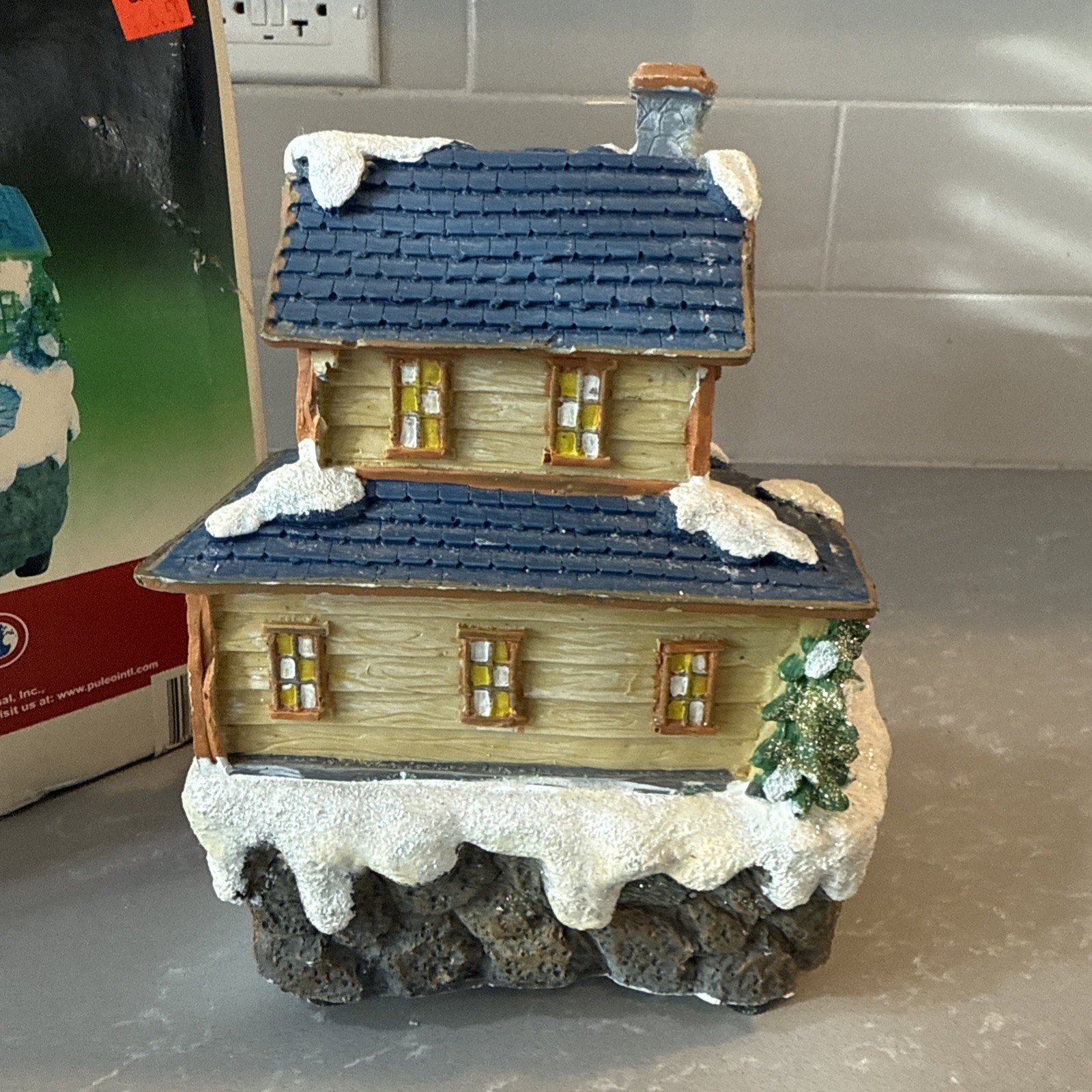Puleo LED Christmas Resin Snowman that moves and house with plug in adapter