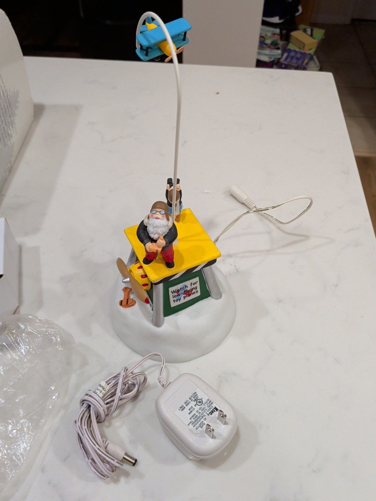 Department 56 North Pole Series Animated Flight Test with Santa Motorized Works