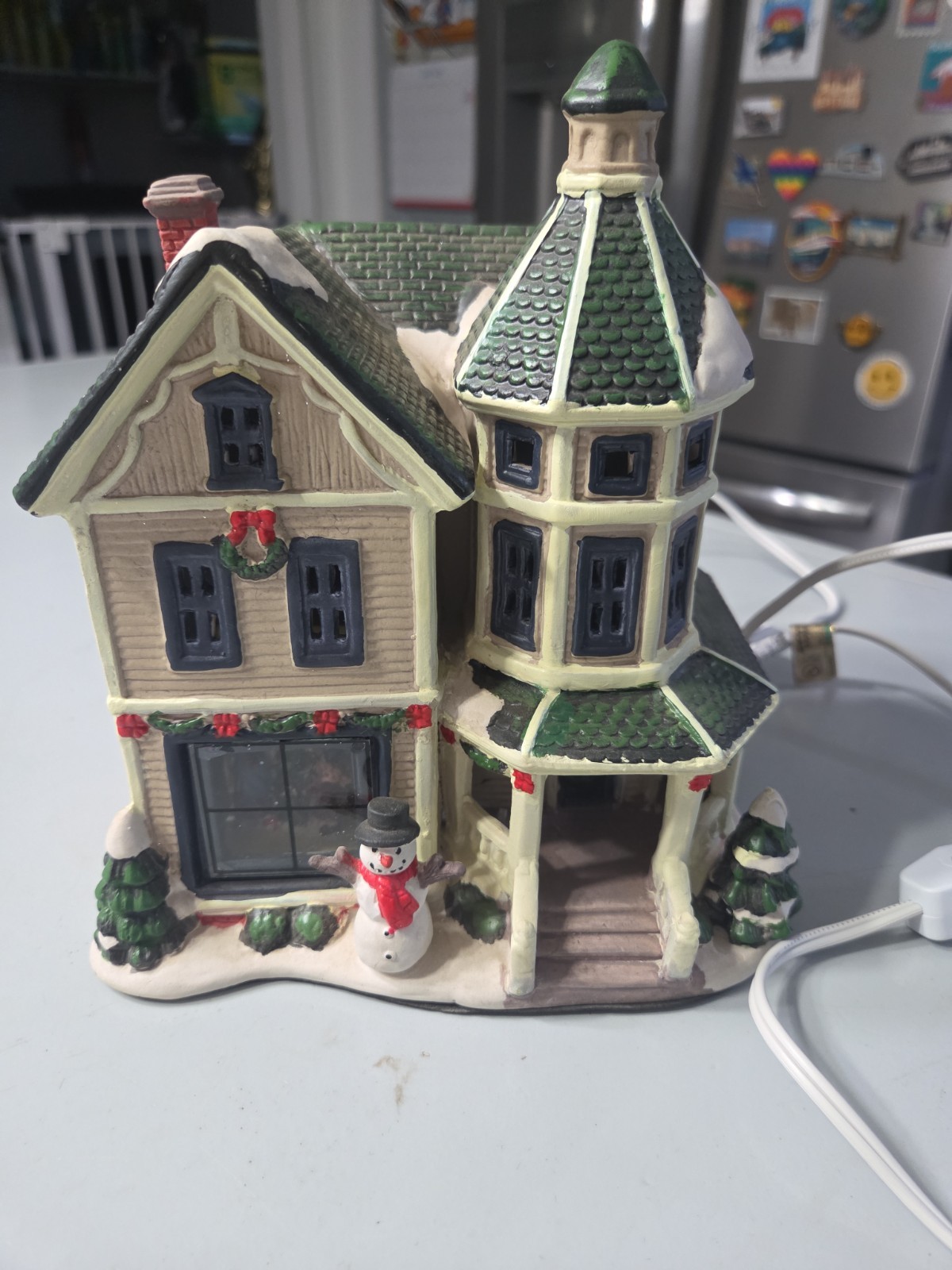 Lighted “FAMILY HOME” building (Christmas)