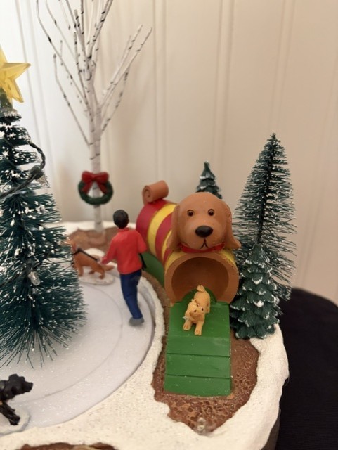 St. Nicholas Square Animated Dog Playground Holiday Decor Lights/Motion/Music