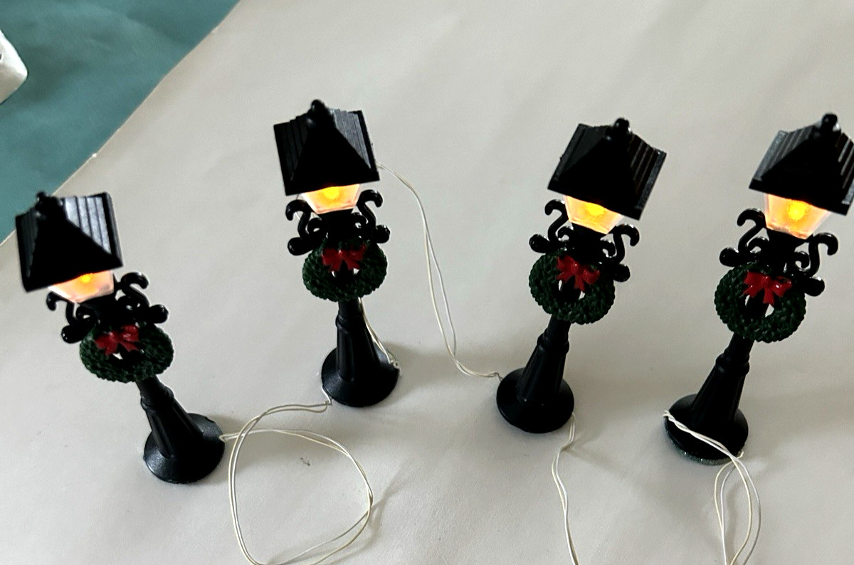 Department 56 Accessories Lit Firepit and Lighted Lamp Posts with Wreathes