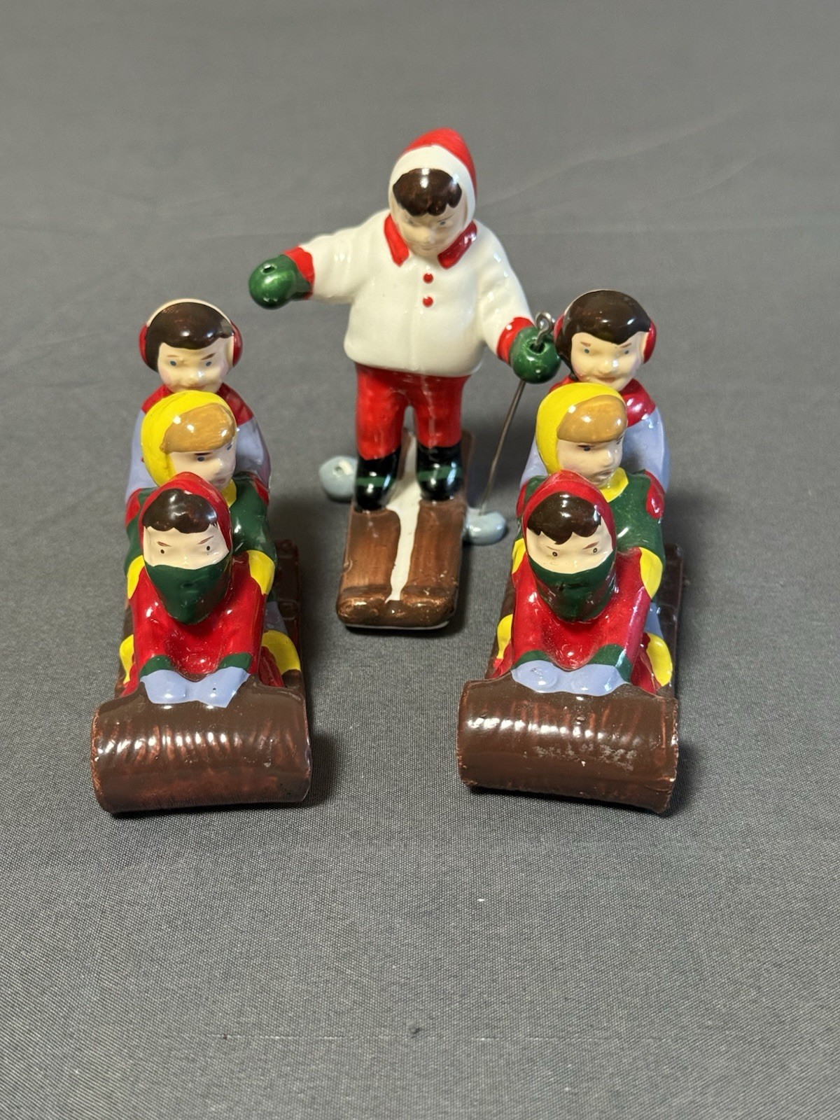 Dept 56 Vintage Christmas Skiers Figurines Set 3 Taiwan Sled Scene