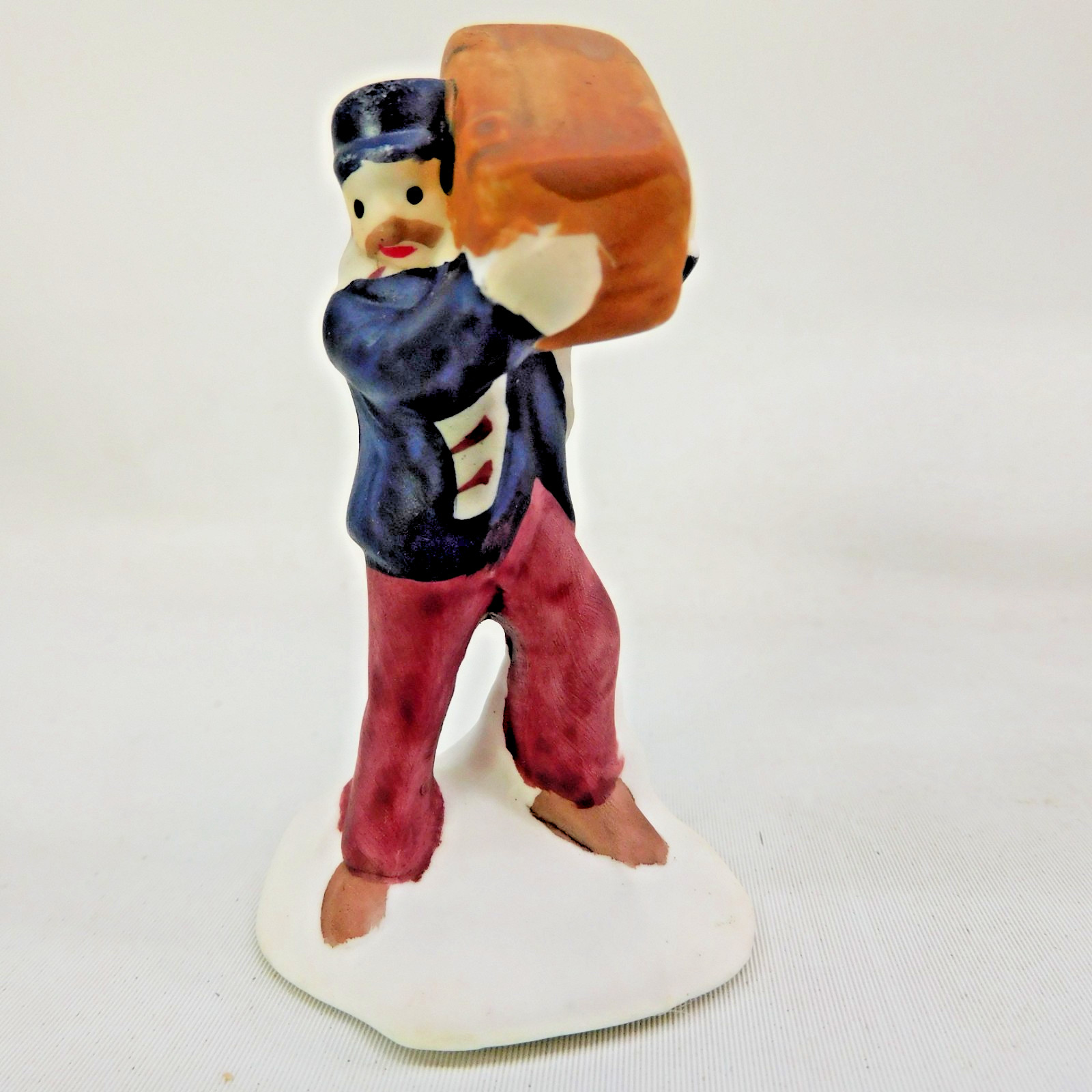 Railroad Porter Figure Hoisting Trunk Christmas Village Porcelain 2.5″H Taiwan