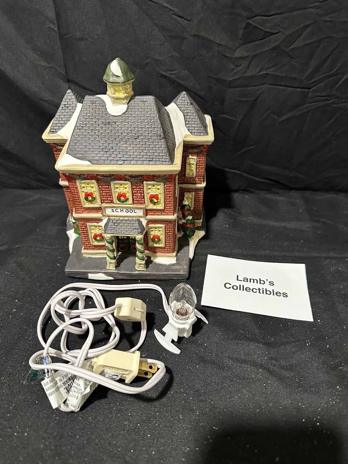 Holiday Inspirations Towne Series ceramic Christmas building lights up New Hope