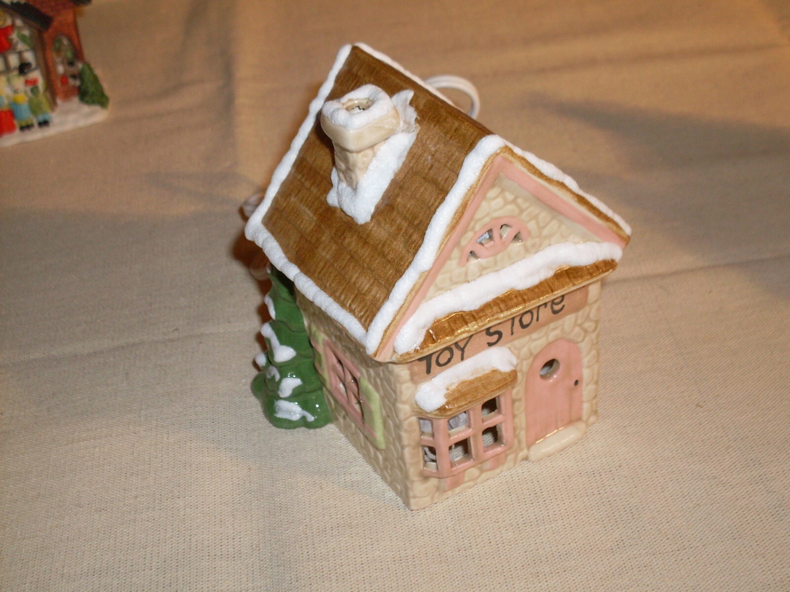 Village Houses. Five colorful, detailed ceramic pieces for display. 4″ tall