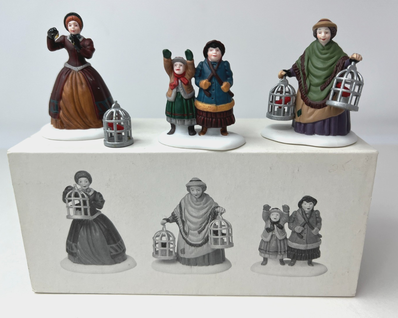 DEPT 56 Heritage Christmas Village Collection “The Bird Seller” #5803 READ
