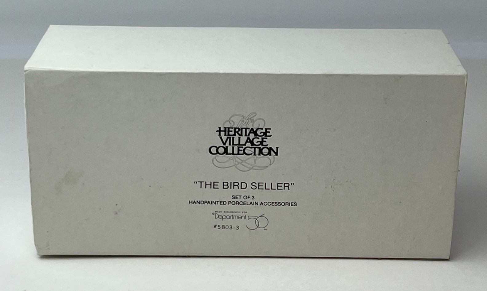 DEPT 56 Heritage Christmas Village Collection “The Bird Seller” #5803 READ