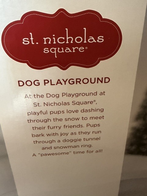St. Nicholas Square Animated Dog Playground Holiday Decor Lights/Motion/Music