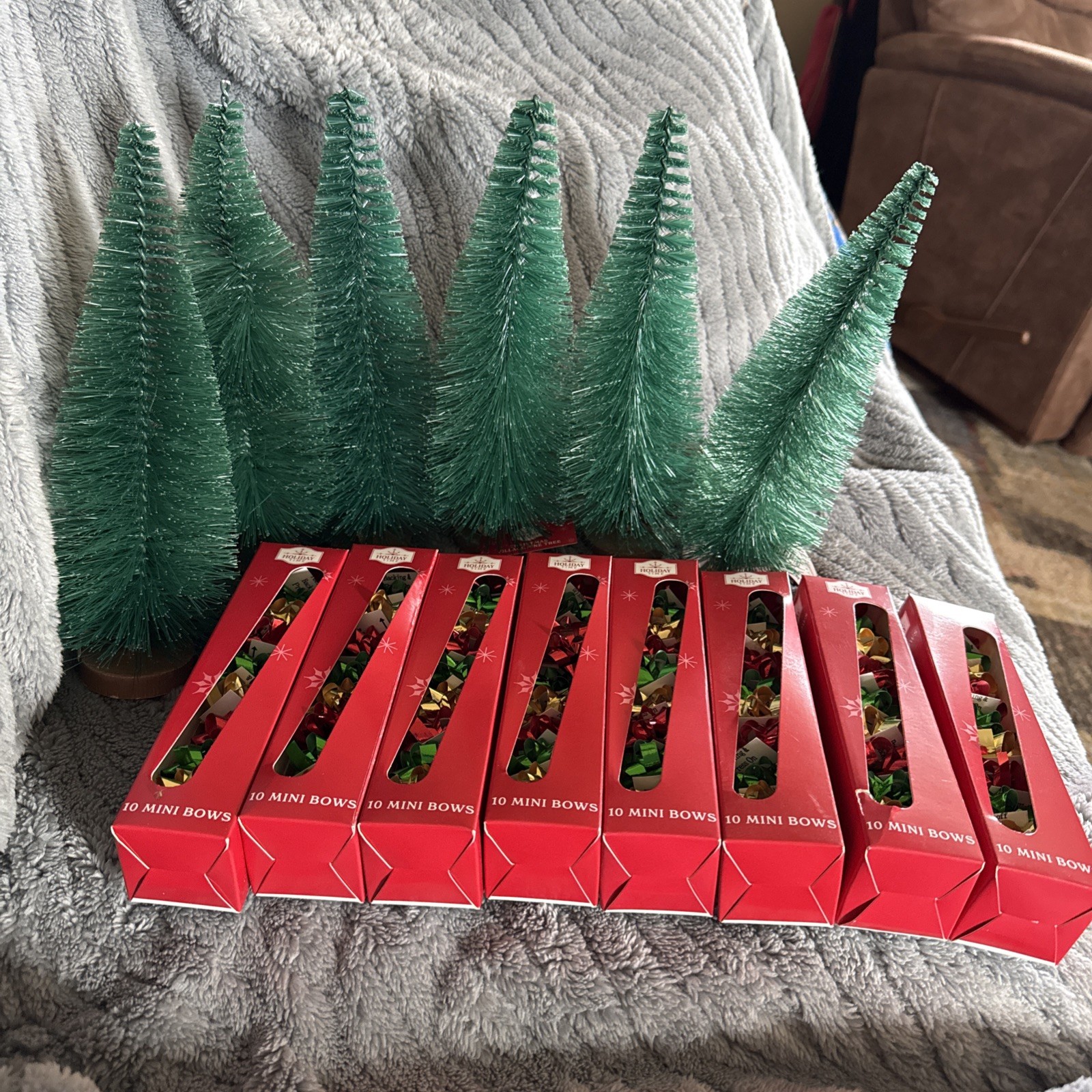 Lot Of 6, 9”Christmas Village Trees & Lot Of 8, 10 Mini Bows Per Box