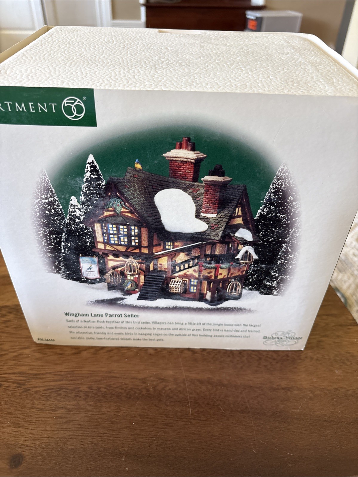 DEPARTMENT 56 Dickens’ Village WINGHAM LANE PARROT SELLER #56.58449 Illuminated