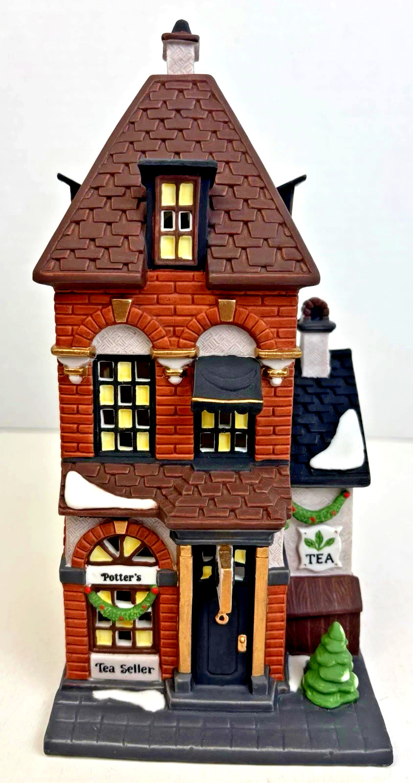 Department 56 Christmas In The City – Potter’s Tea Seller #58807