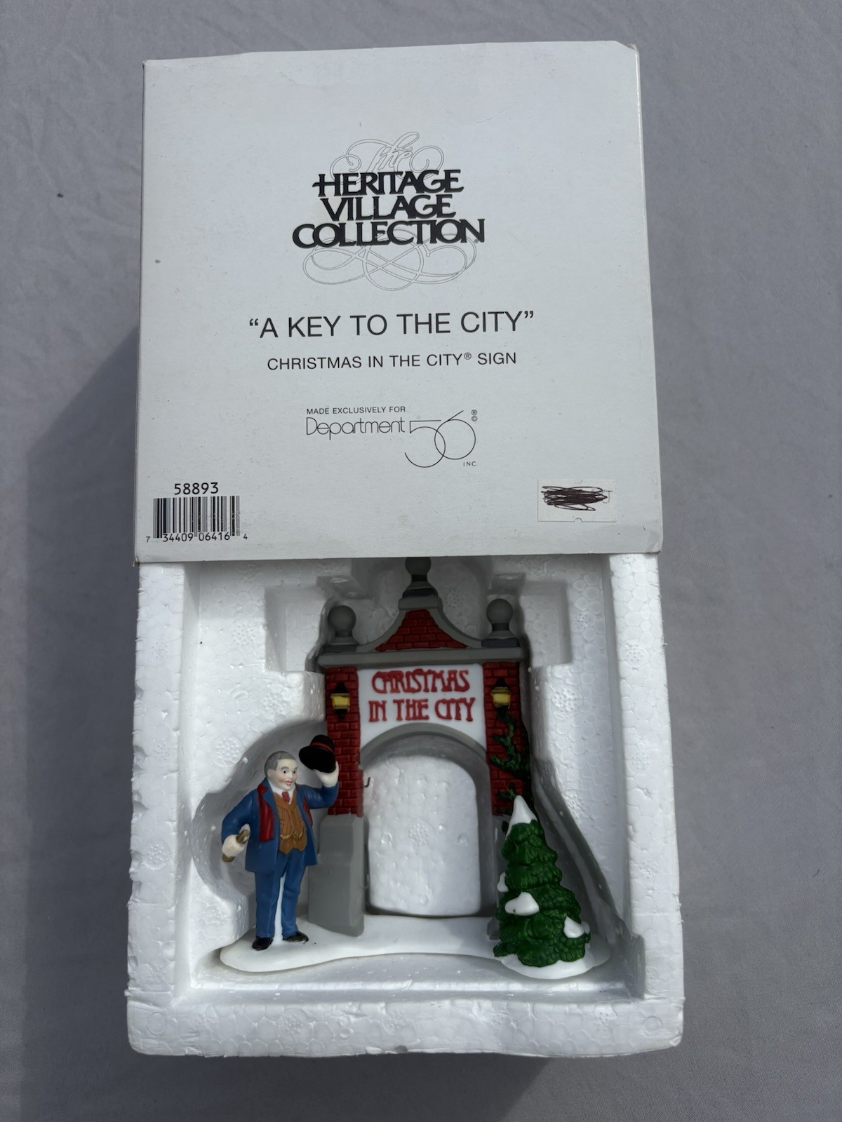 Department 56 Christmas in the City “A Key to the City” #58925 – Retired -W/ Box