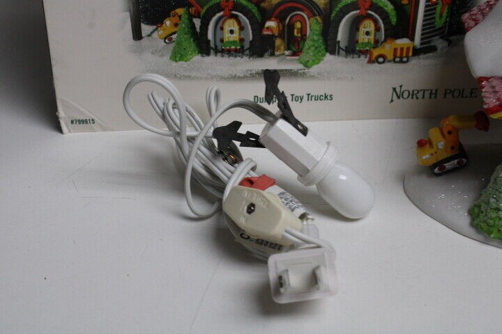Department 56 North Pole Series Dumpy’s Toy Trucks #799915