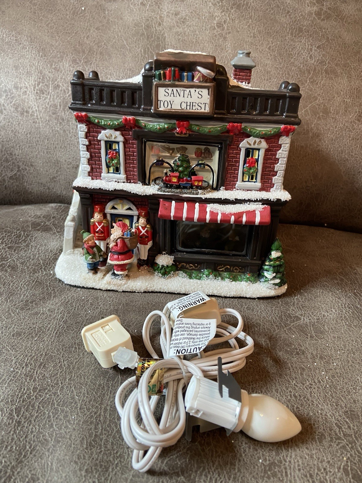 St. Nicholas Square Christmas Village 2010 Santa’s Toy Chest Illuminated W/Box