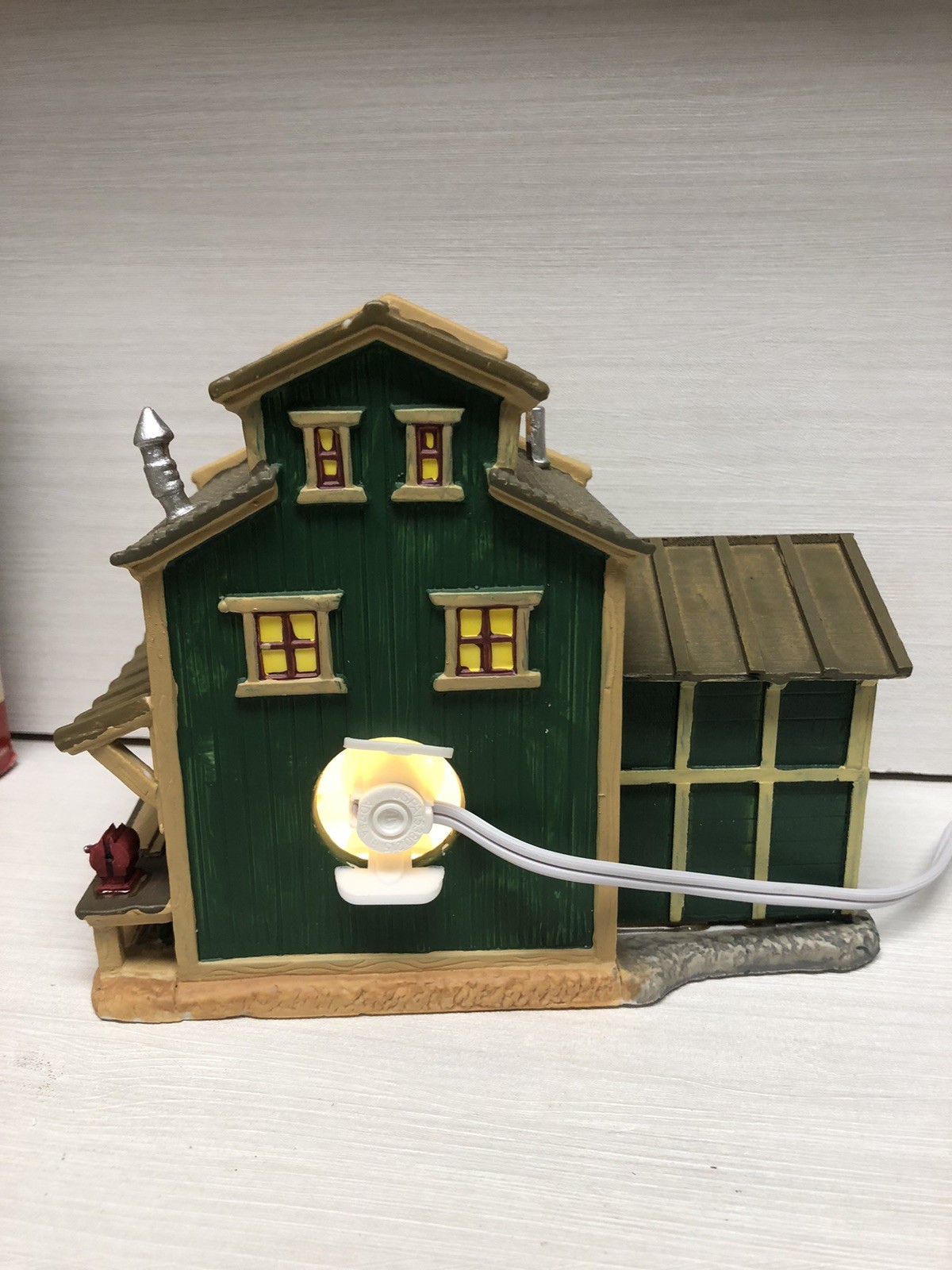 2005 LEMAX Harvest Crossing Lighted “MENARD CASHWAY LUMBER” #55325