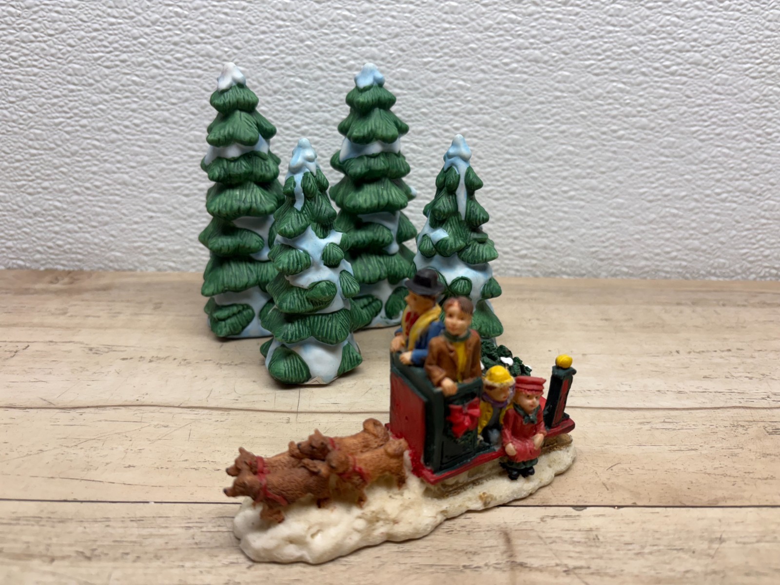 Set Of 5 Christmas Village Figurines Family Sleighting With Dogs And Pine Trees