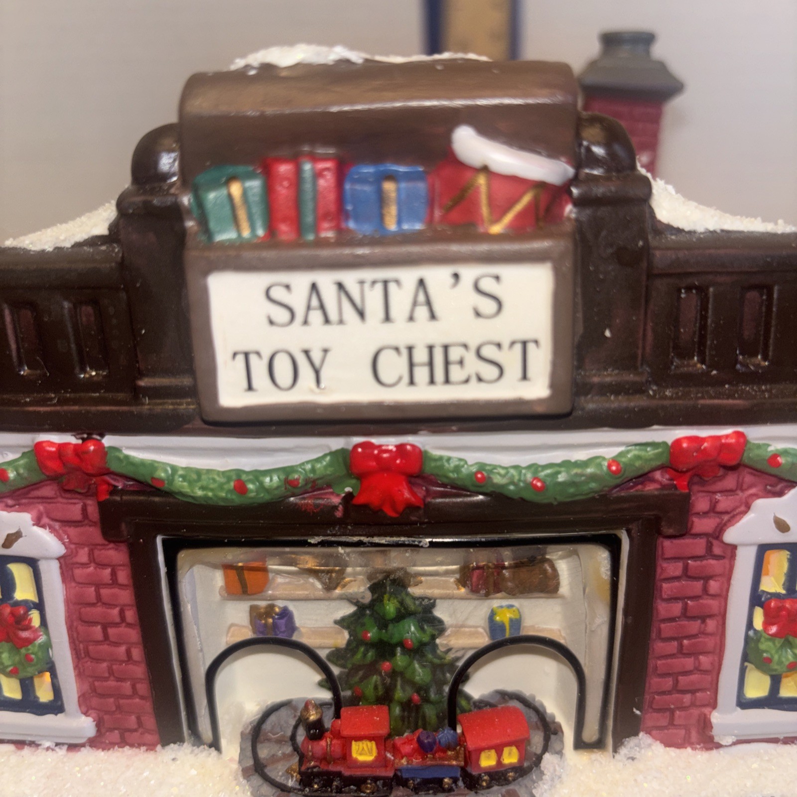 2010 St Nicholas Square Christmas Village Santa’s Toy Chest Illuminated