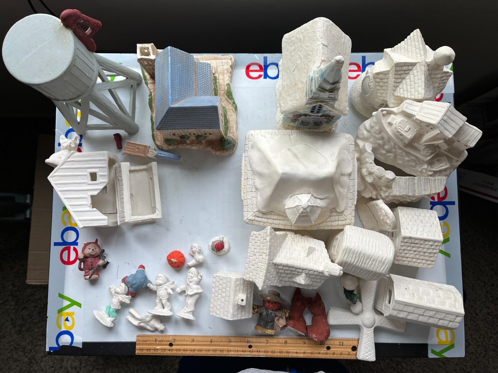 Lot of Ceramic Mostly Unpainted Figures Christmas Halloween Easter Village