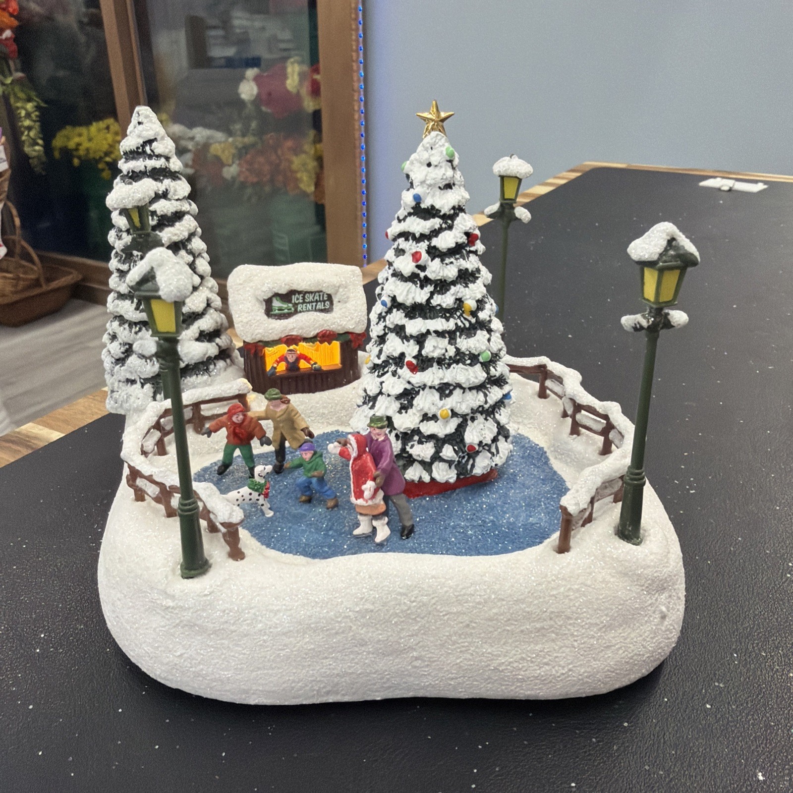 2024 Thomas Kinkade Teleflora 2024 Oh What Fun Christmas Village Ice Rink