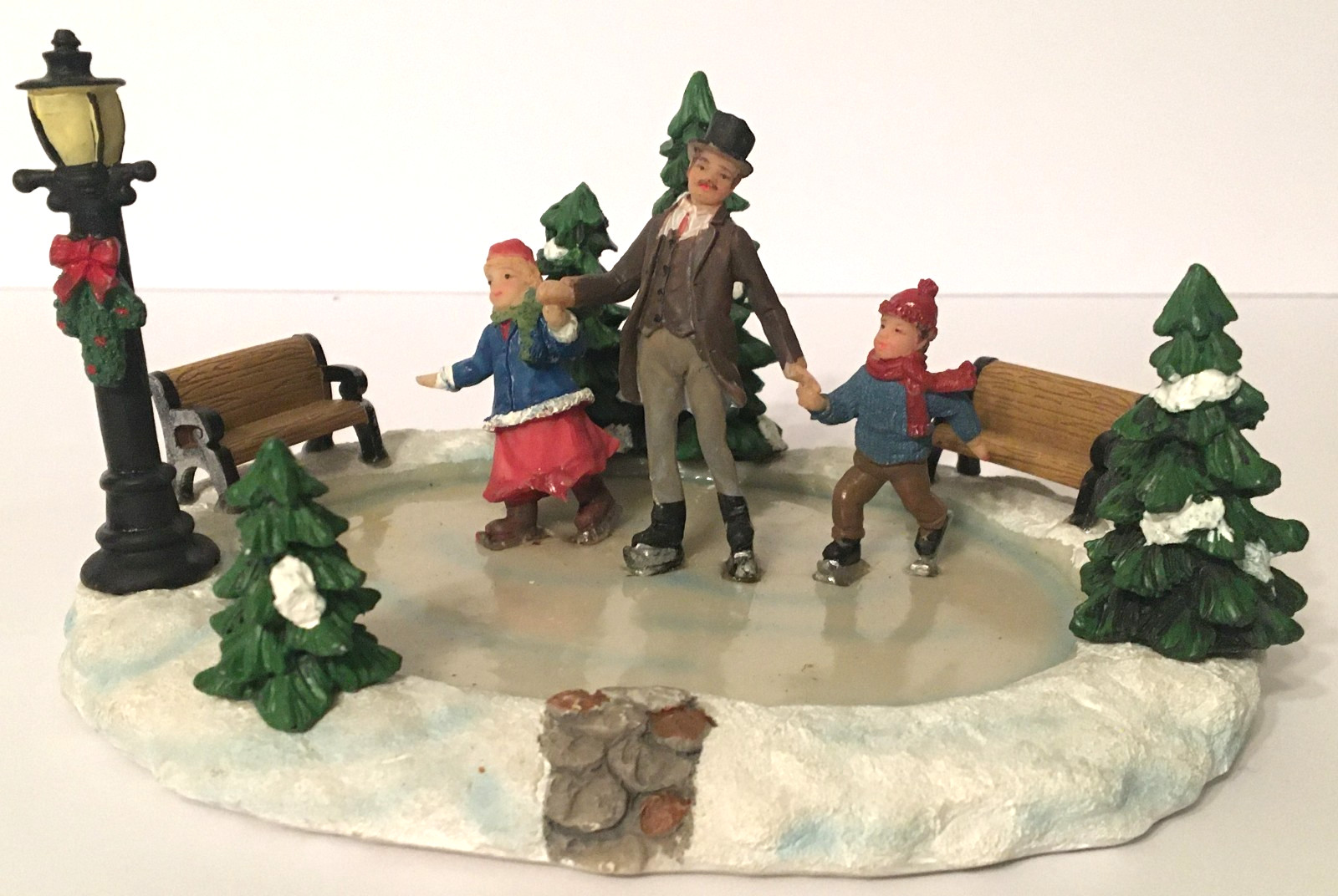 St Nicholas Square Village Collection Holiday Skating Pond Figurine