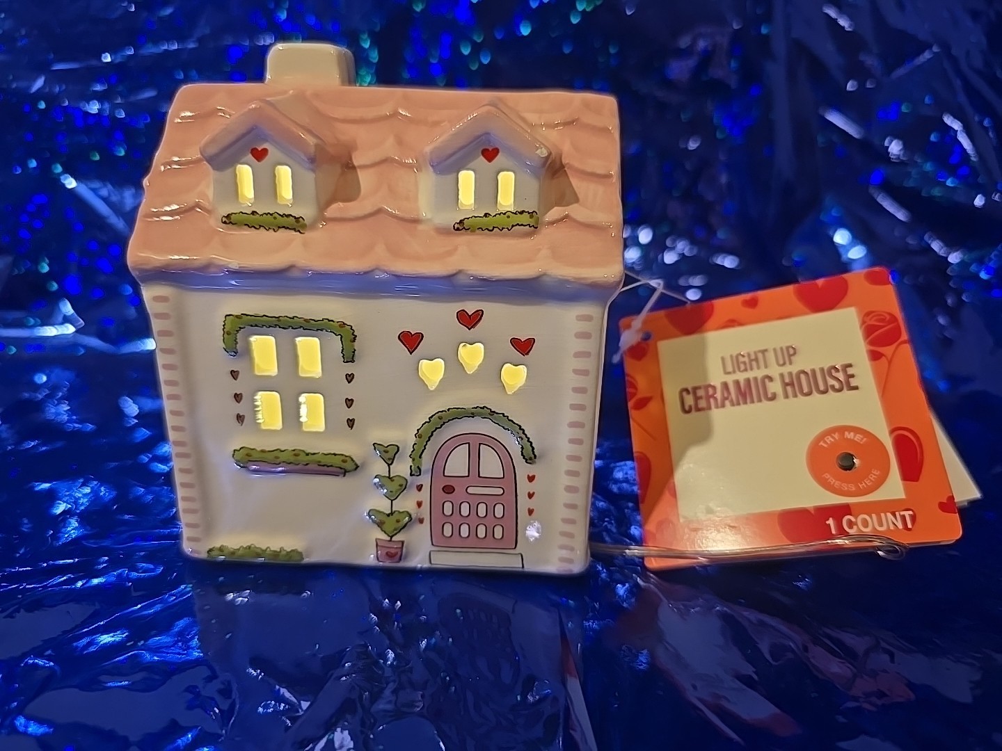 LIGHT UP CERAMIC HOUSE. $11 Each