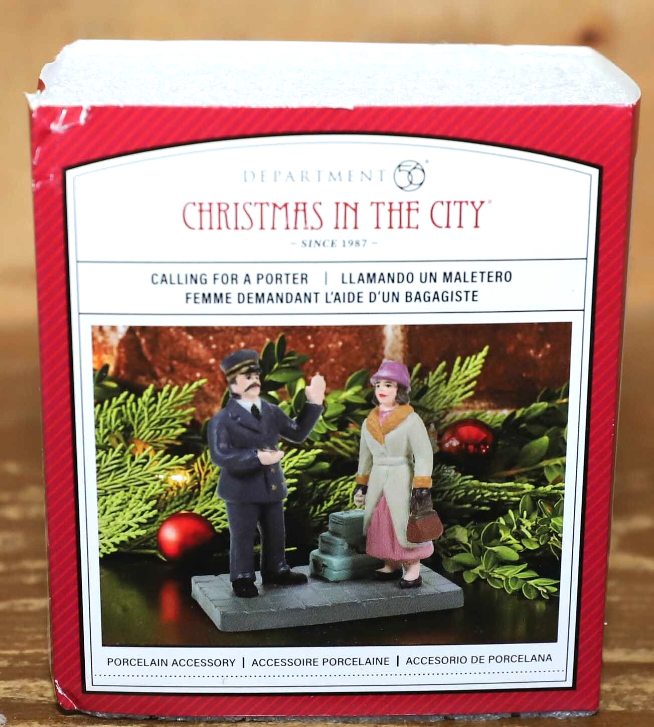 DEPT 56 CALLING FOR A PORTER 6011381 CHRISTMAS IN THE CITY CIC