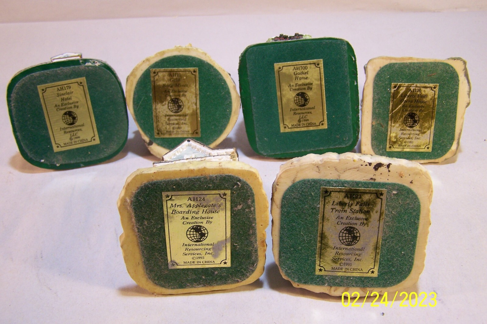 International Resourcing Services Inc–miniature houses-6-v clean
