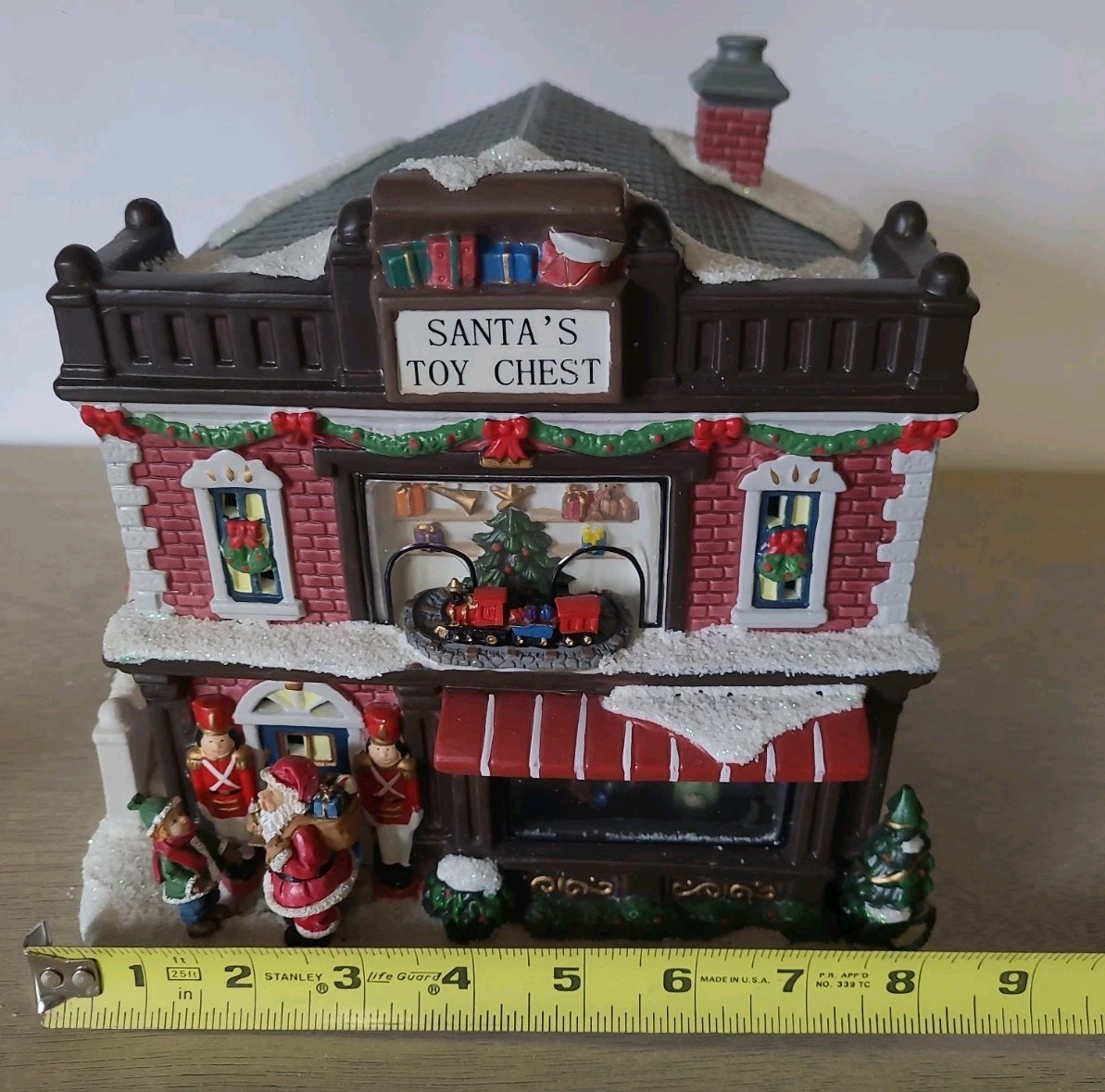 St. Nicholas Square Christmas Village 2010 Santa’s Toy Chest Illuminated W/Box