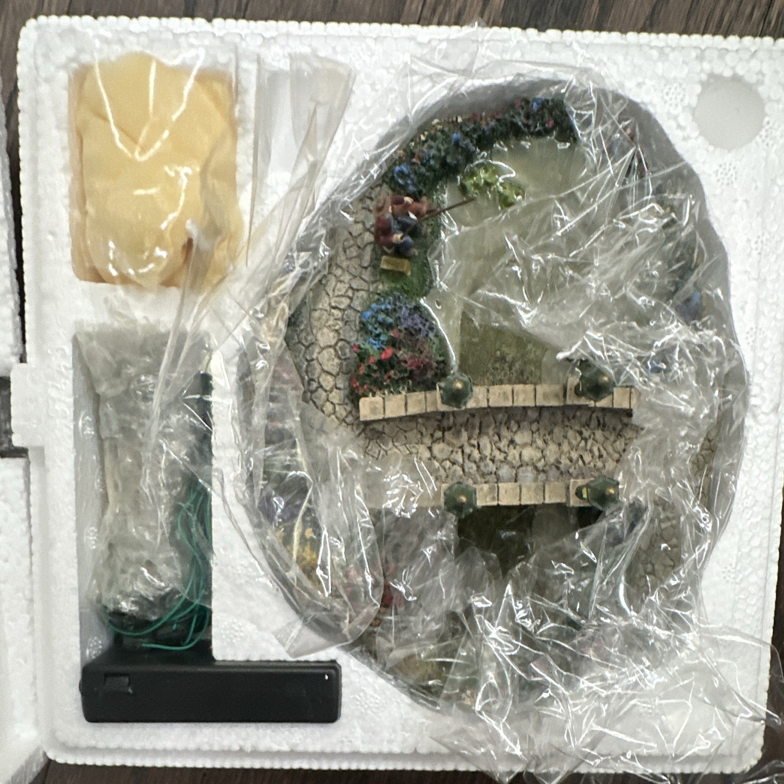 The Hawthorne Village 79982 the limited-edition “Lamplight Bridge”
