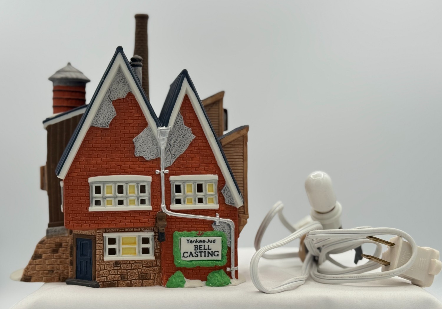 Dept 56 New England Village Series “Yankee Jud Bell Casting” #5643-0