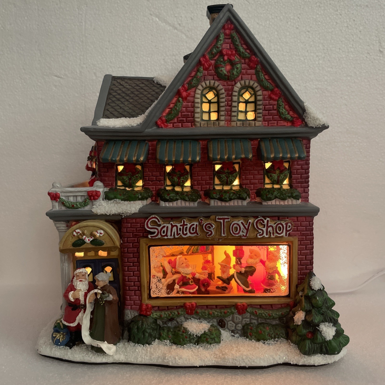 St Nicholas Square Santa’s Toy Shop Lighted Musical Building Christmas Village