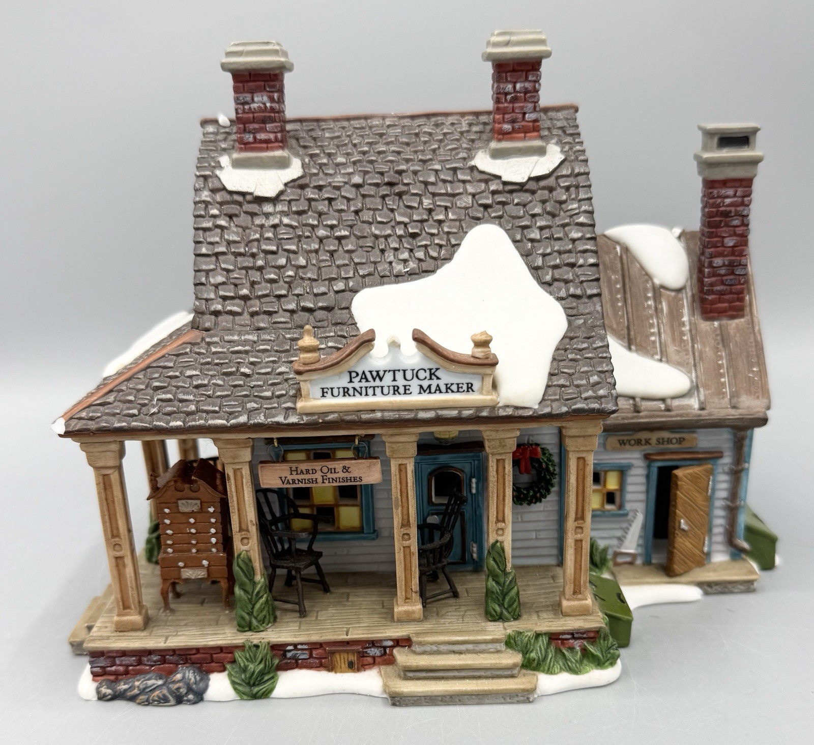 Dept 56 “Pawtuck Furniture Maker” New England CHIPPED