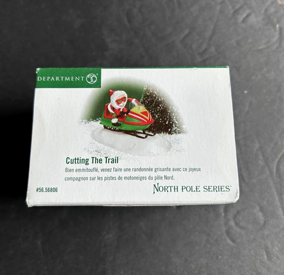 NIB-Dept 56 North Pole Series- Cutting the Trail #56.56806