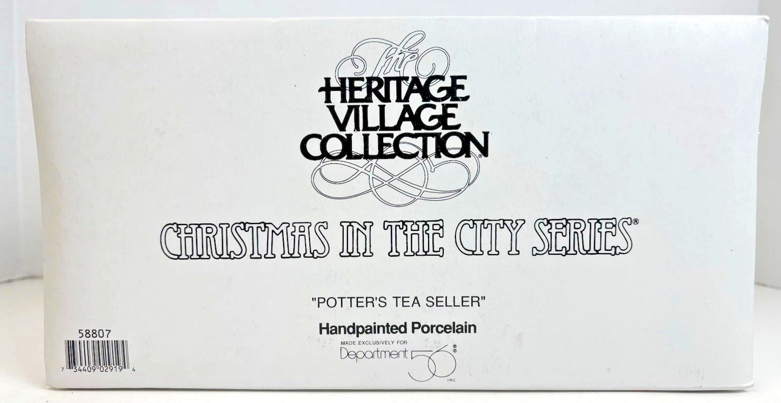 Department 56 Christmas In The City – Potter’s Tea Seller #58807