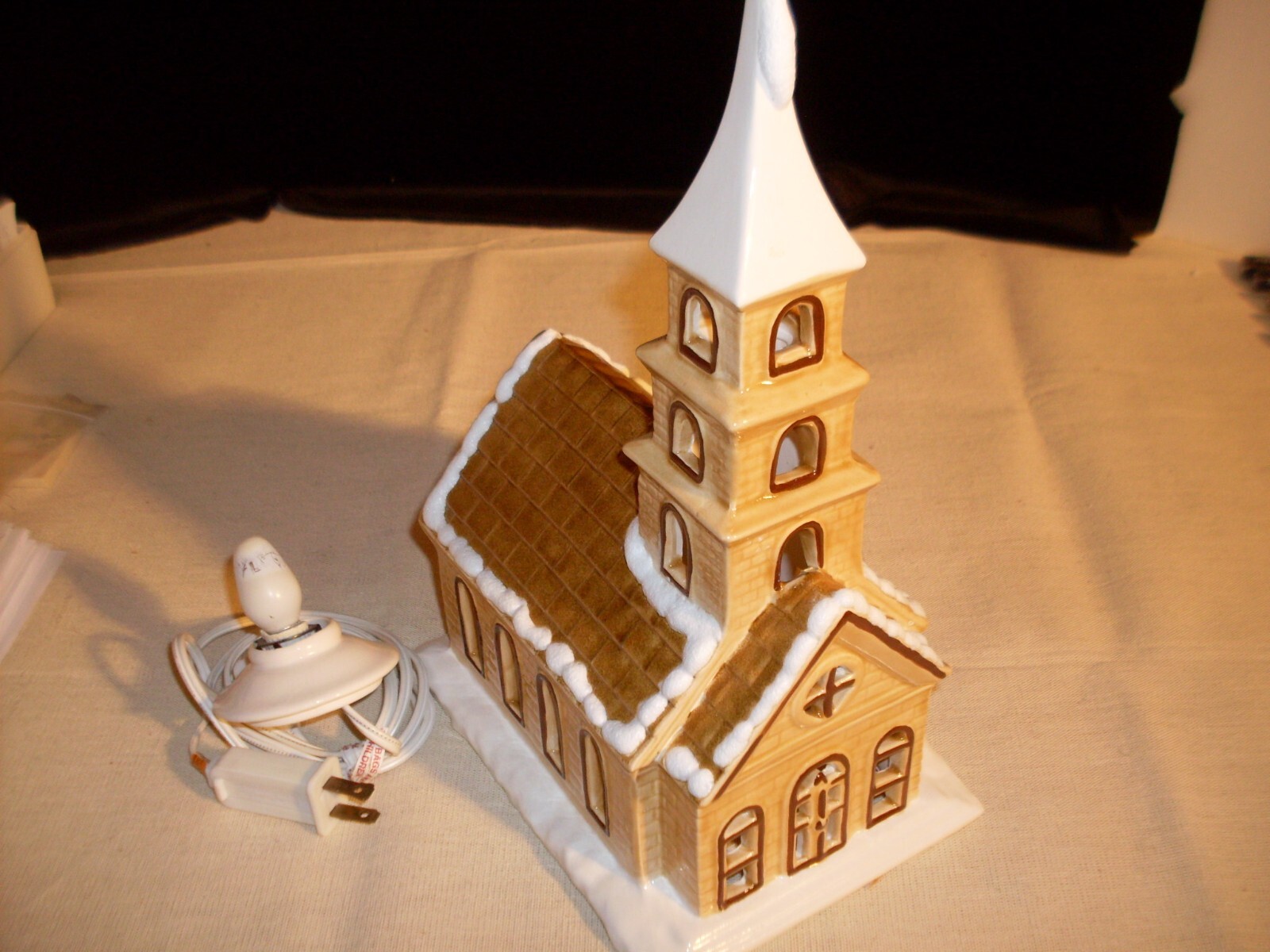 Ceramic Village Church. Detailed, snow accent, cord-lighted. By Byron Molds