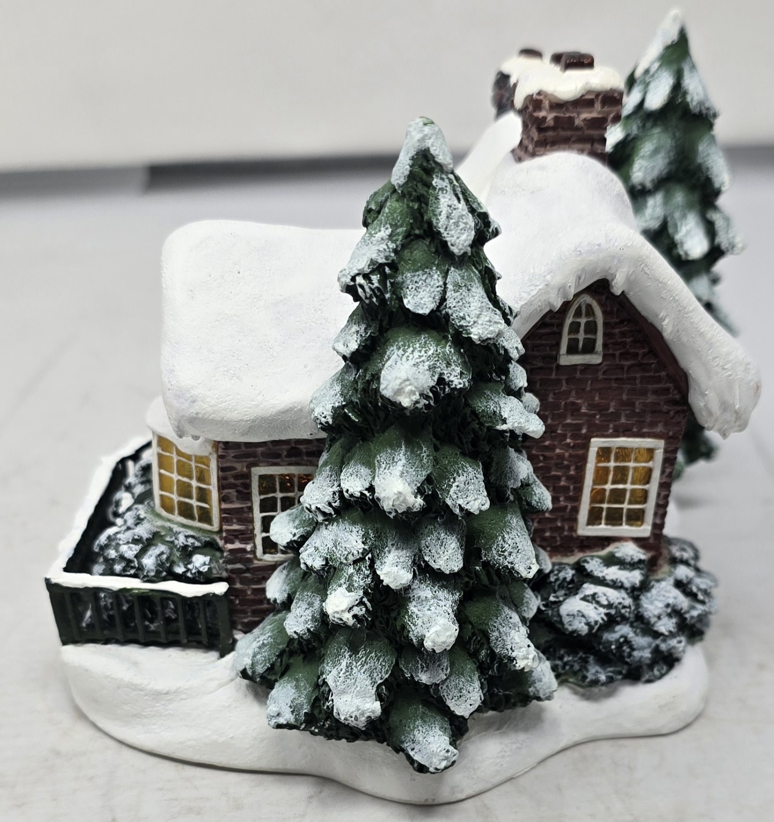 A Village Christmas THOMAS KINKADE PAINTER OF LIGHT TELEFLORA VILLAGE HOUSE