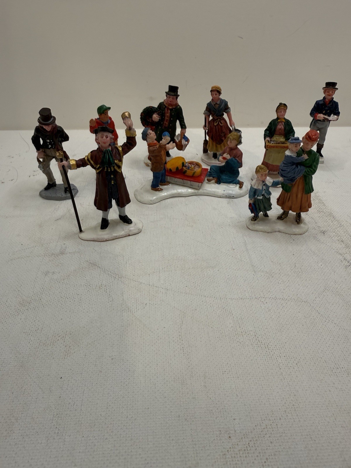 Vintage Nine Winter Lemax Figurines Approximate Heights 2.5”