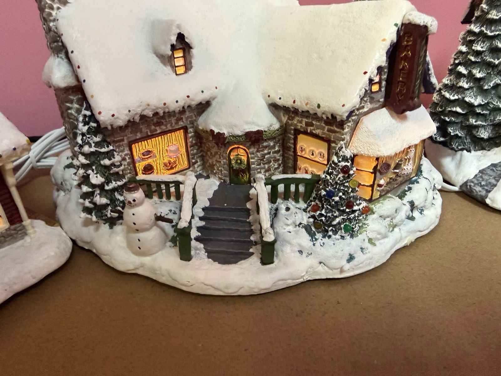 Thomas Kinkade’s Village Christmas Four Pieces collection by Hawthorne Village