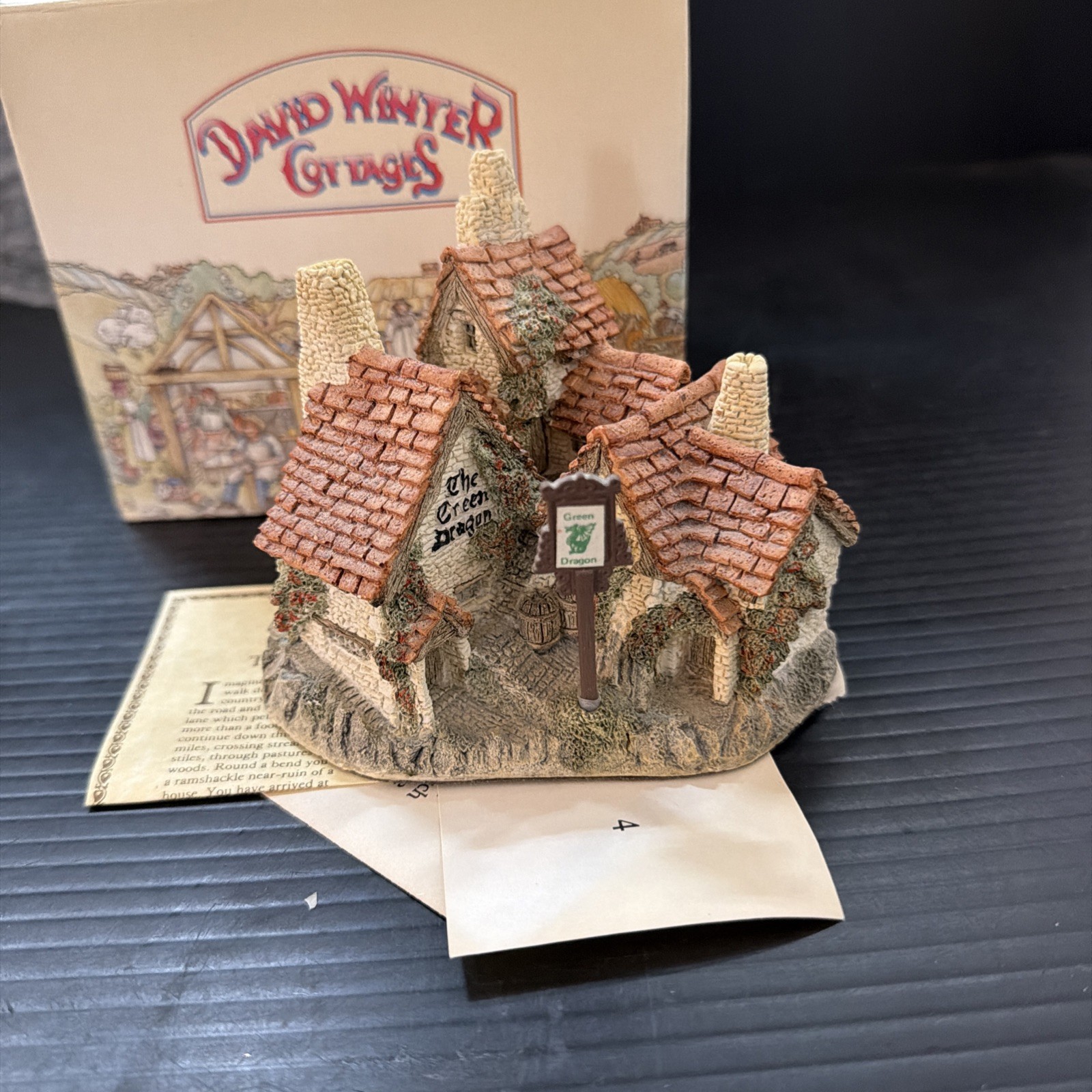 Green Dragon Pub by David Winter (1983) with original plastic sign