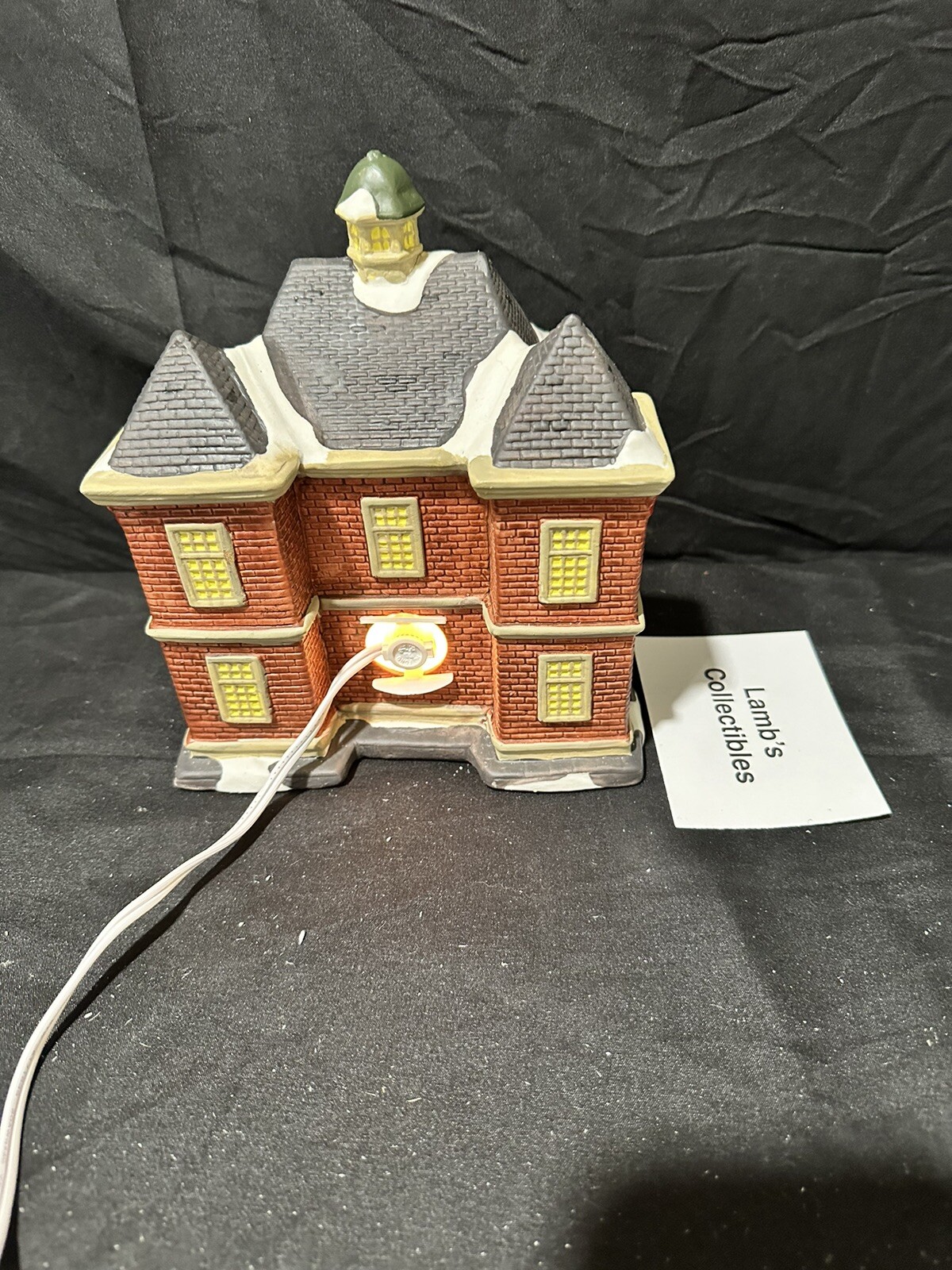 Holiday Inspirations Towne Series ceramic Christmas building lights up New Hope
