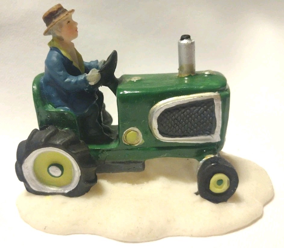 O’Well Christmas Village Figurine-Farmer Driving Green Tractor Holiday