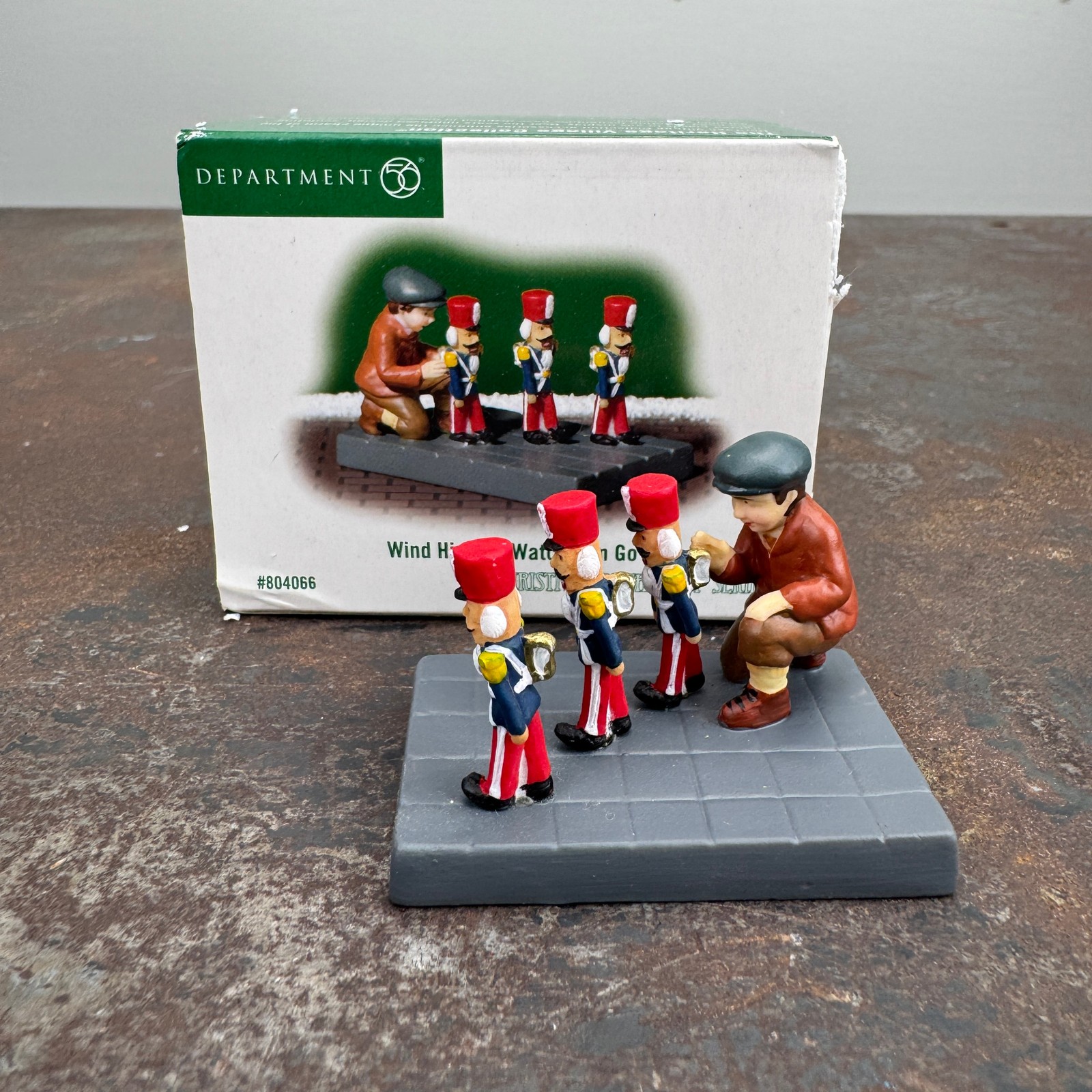 Dept 56 Chistmas in the City Series WIND HIM UP, WATCH HIM GO #804066 w/ Box