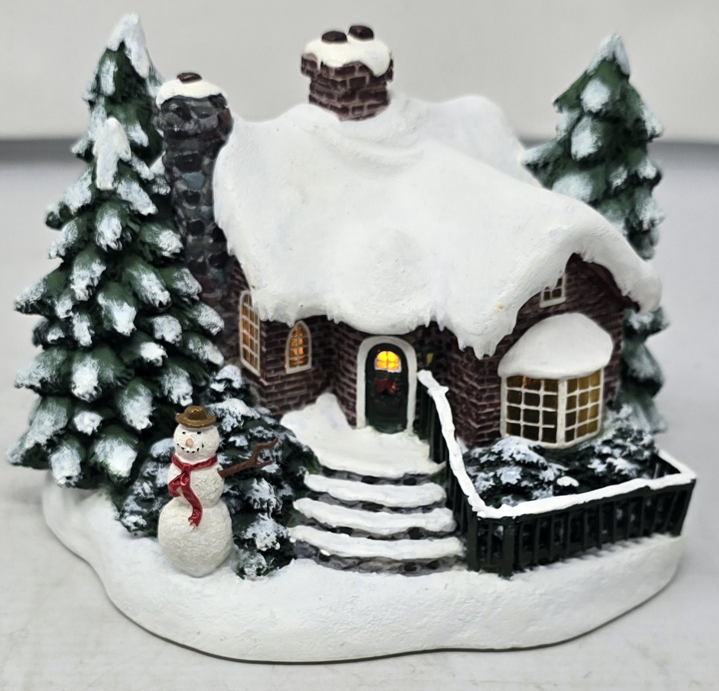 A Village Christmas THOMAS KINKADE PAINTER OF LIGHT TELEFLORA VILLAGE HOUSE