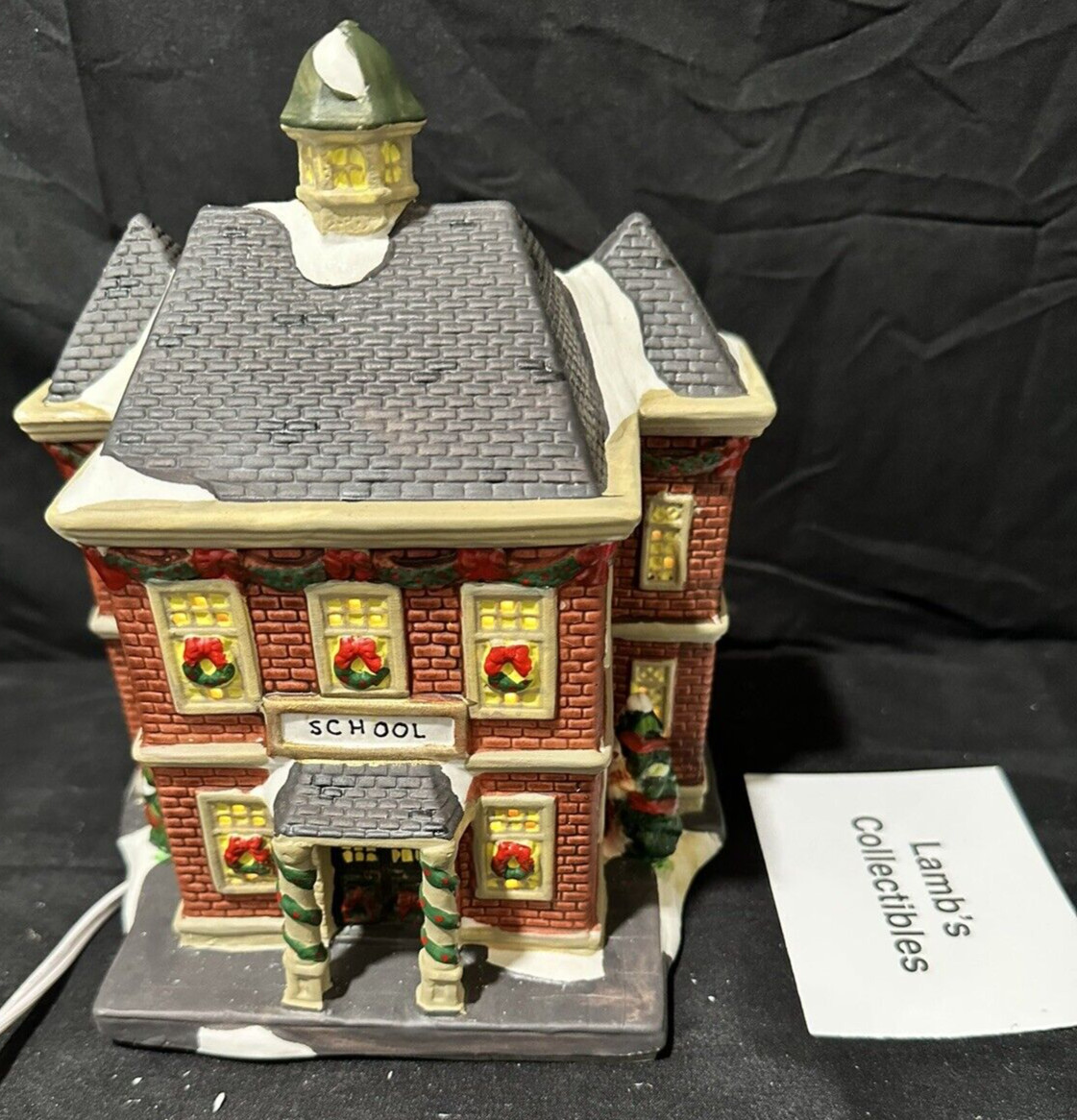 Holiday Inspirations Towne Series ceramic Christmas building lights up New Hope