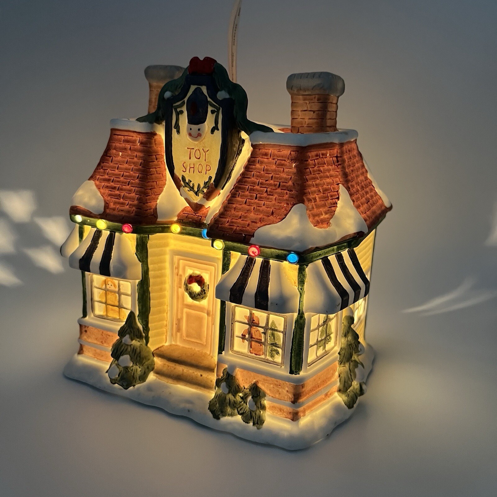 Vintage Saint Nicholas square. Lighted Hand Painted Porcelain Toy Shop.