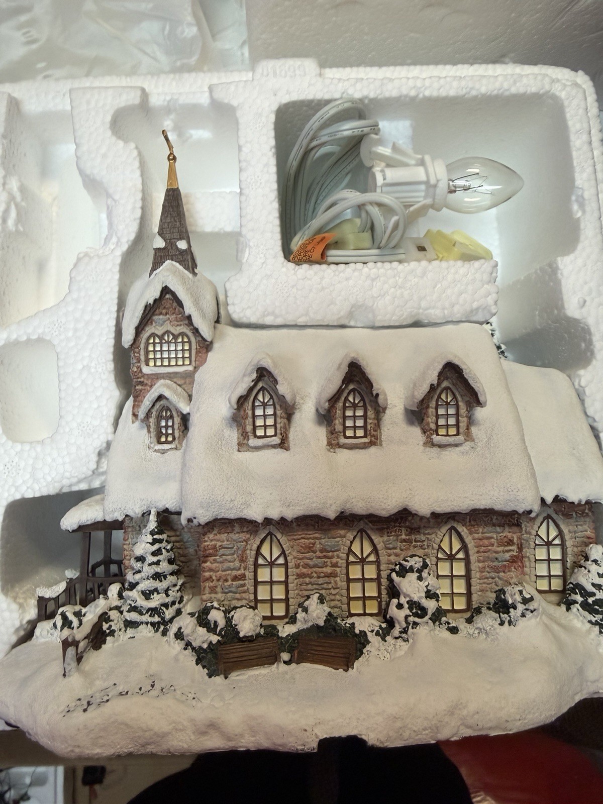 Thomas Kinkade’s Village Christmas Four Pieces collection by Hawthorne Village