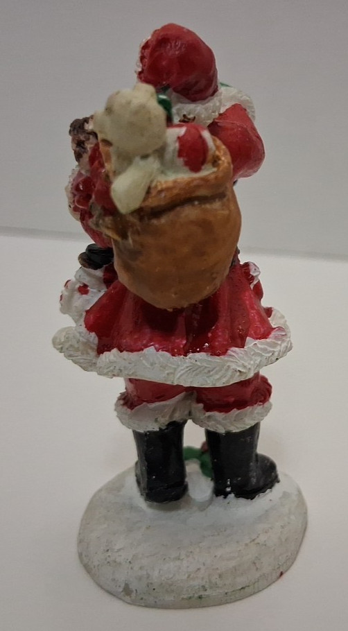 Lot Of 8 Unbranded Polyresin Christmas Village Figurines 2.5 to 2.75 Inches