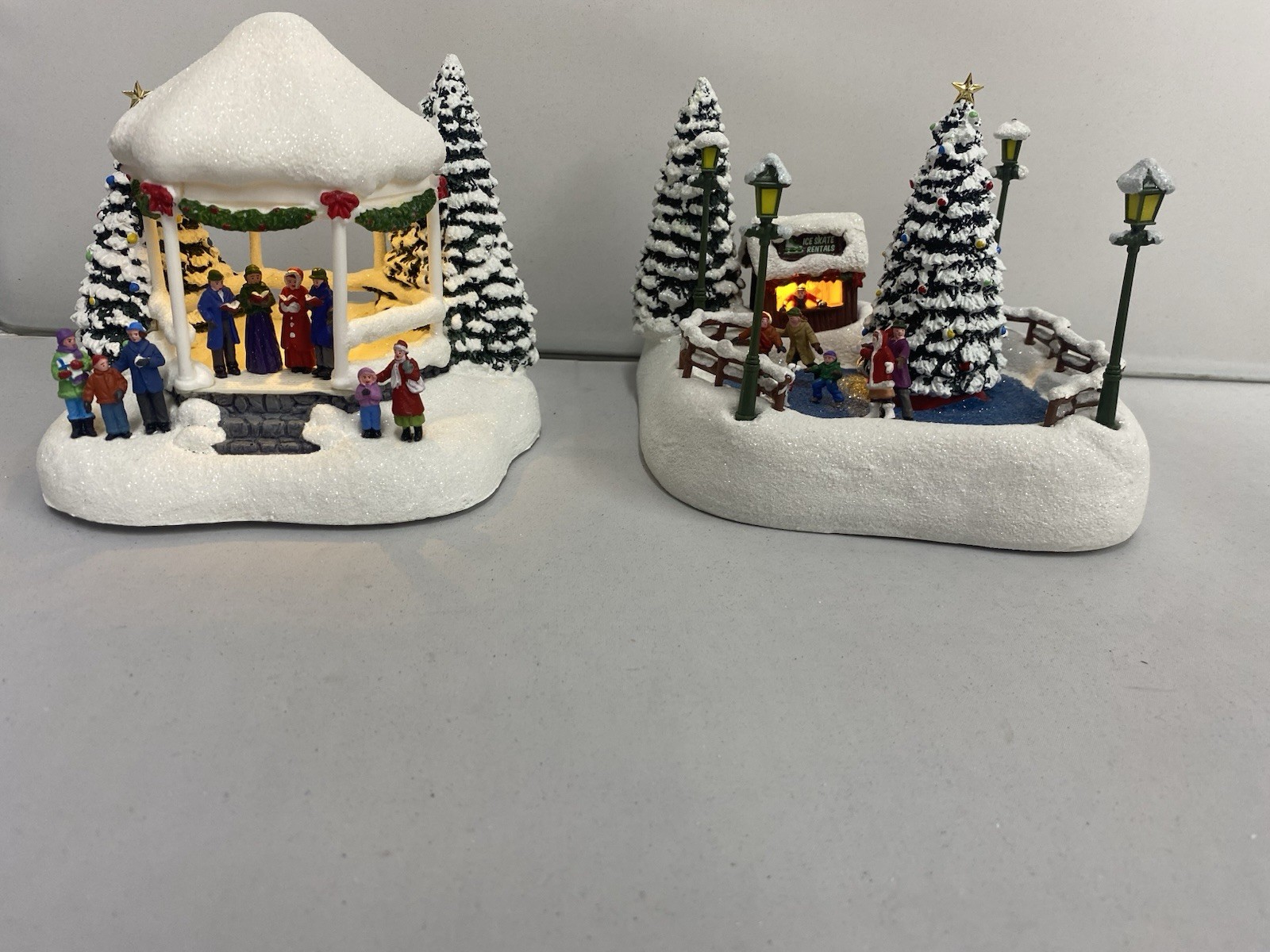 2023 & 2024 Thomas Kinkade Teleflora Christmas Skaters and Carolers Set of 2
