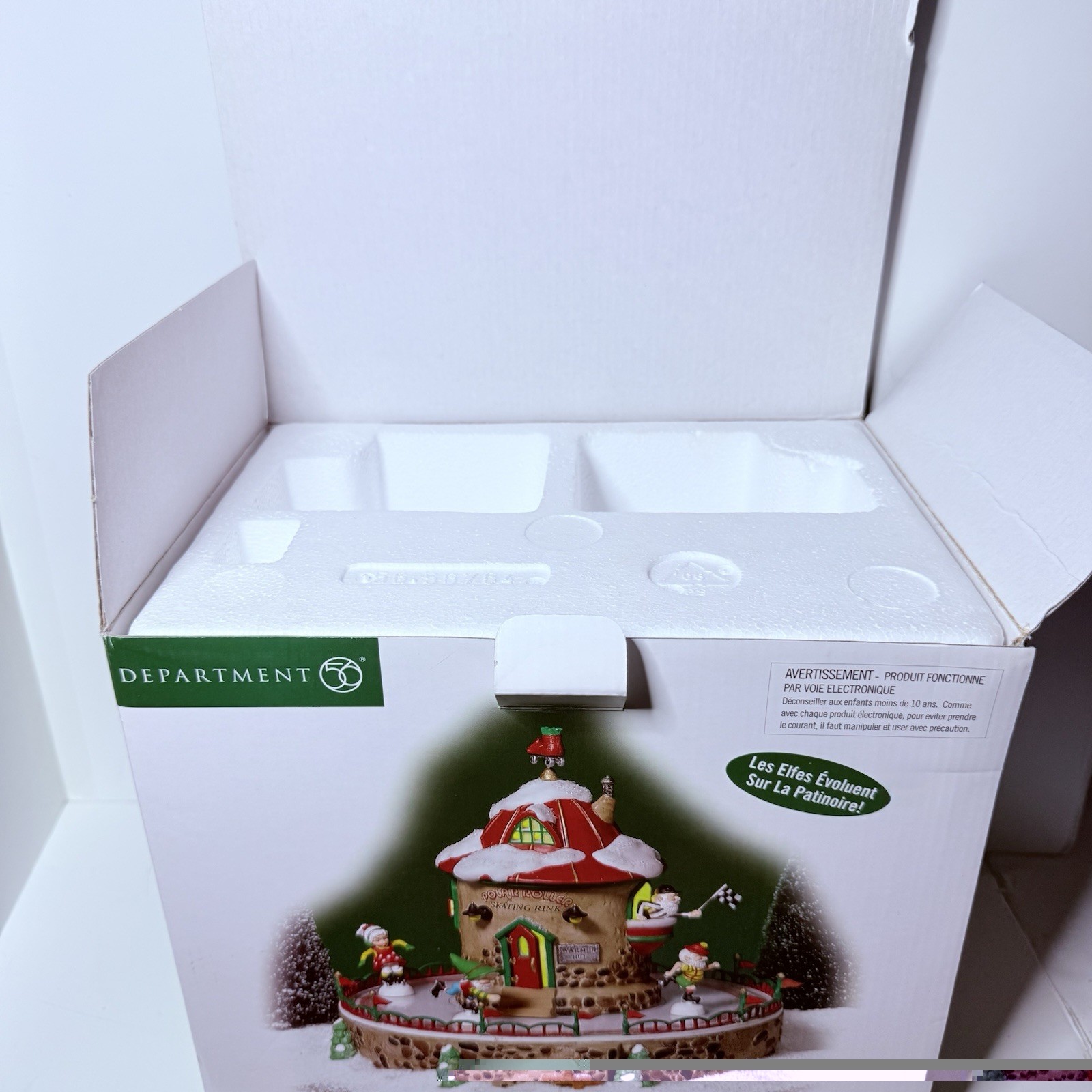 Department 56 North Pole Series Polar Roller Rink Illuminated Christmas Village