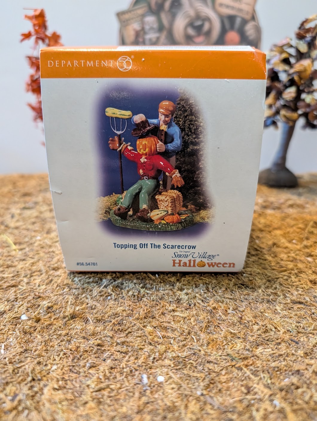 Dept 56 Halloween – Accessory – Topping off the Scarecrow